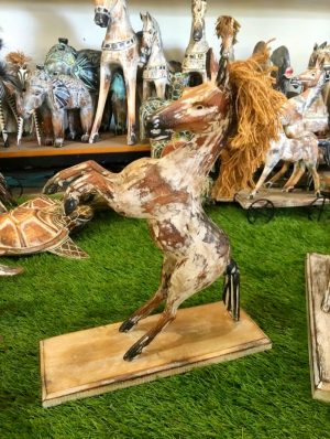 Wooden horse with hair decoration