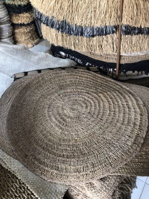 Woven round carpet
