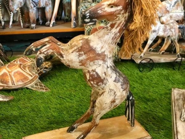 Wooden horse with hair decoration